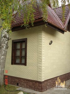 отделка фасада дома искусственным камнем	